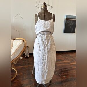 A. Gold E. Vintage 90’s Cotton Apron Dress.